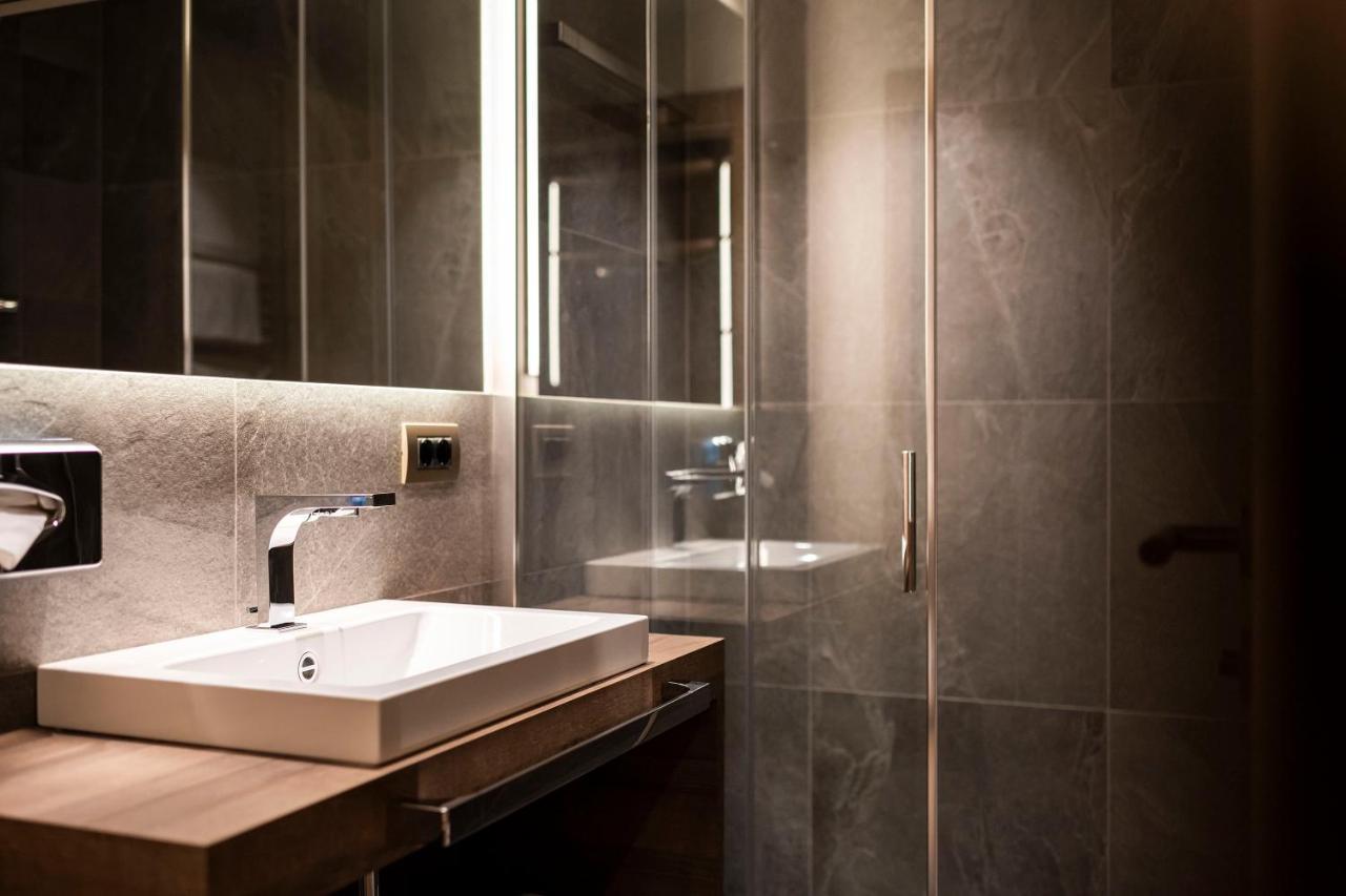 Post Alpina - Family Mountain Chalets San Candido Bagian luar foto