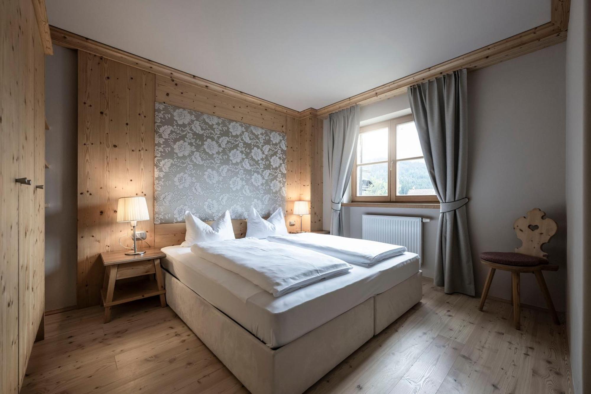 Post Alpina - Family Mountain Chalets San Candido Bagian luar foto